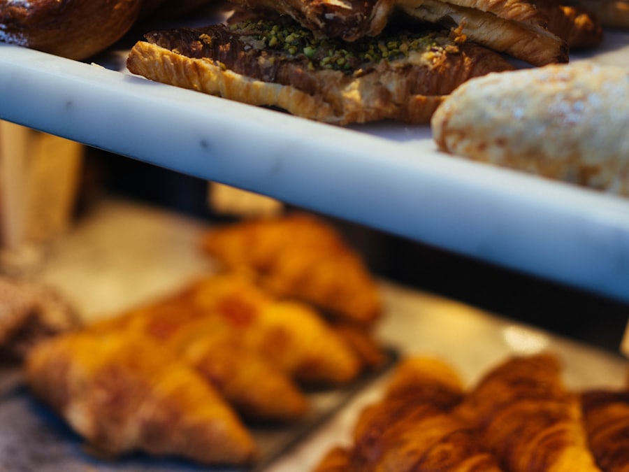 Shelf of croissants on the Flour & Feather bakery site