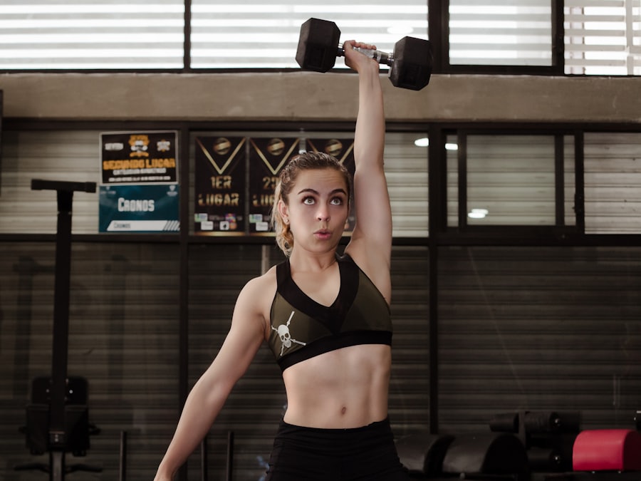 Athlete training with a dumbbell on the Tempo Strength app